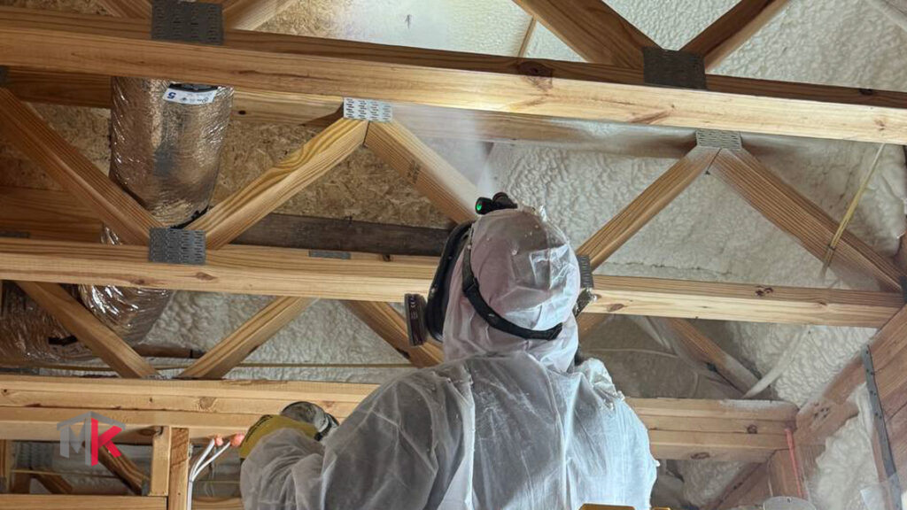 Spray foam insulation installation improving home energy efficiency in Houston Texas

